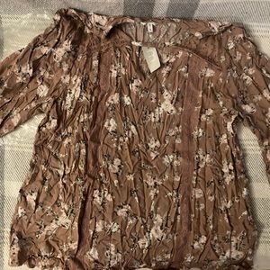 XL Floral shirt from Maurice’s never worn, with tags.